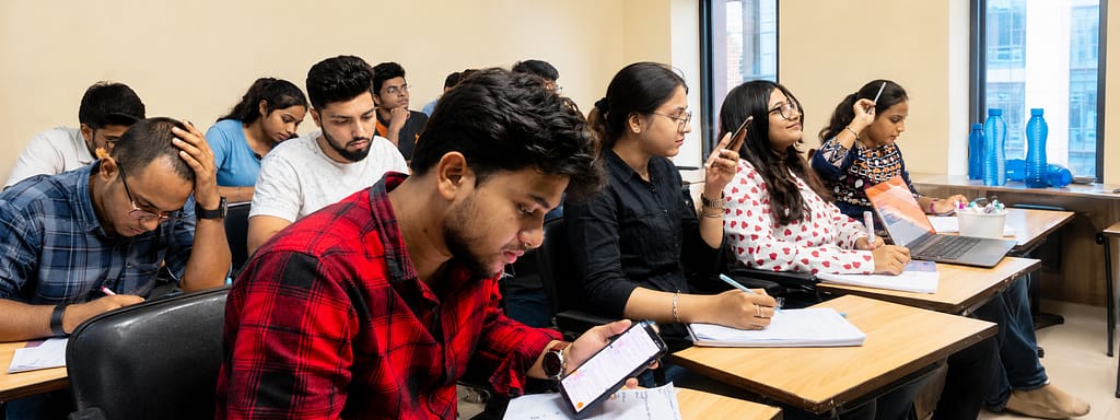 Students attending an aptitude classroom session at PREPON